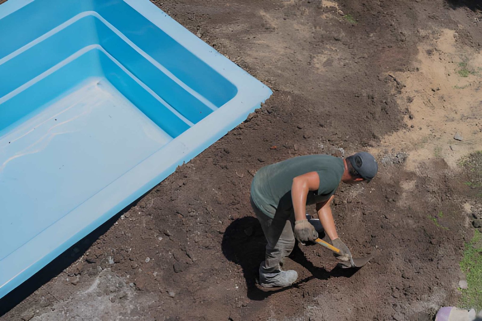 Fiberglass pool installation in progress
