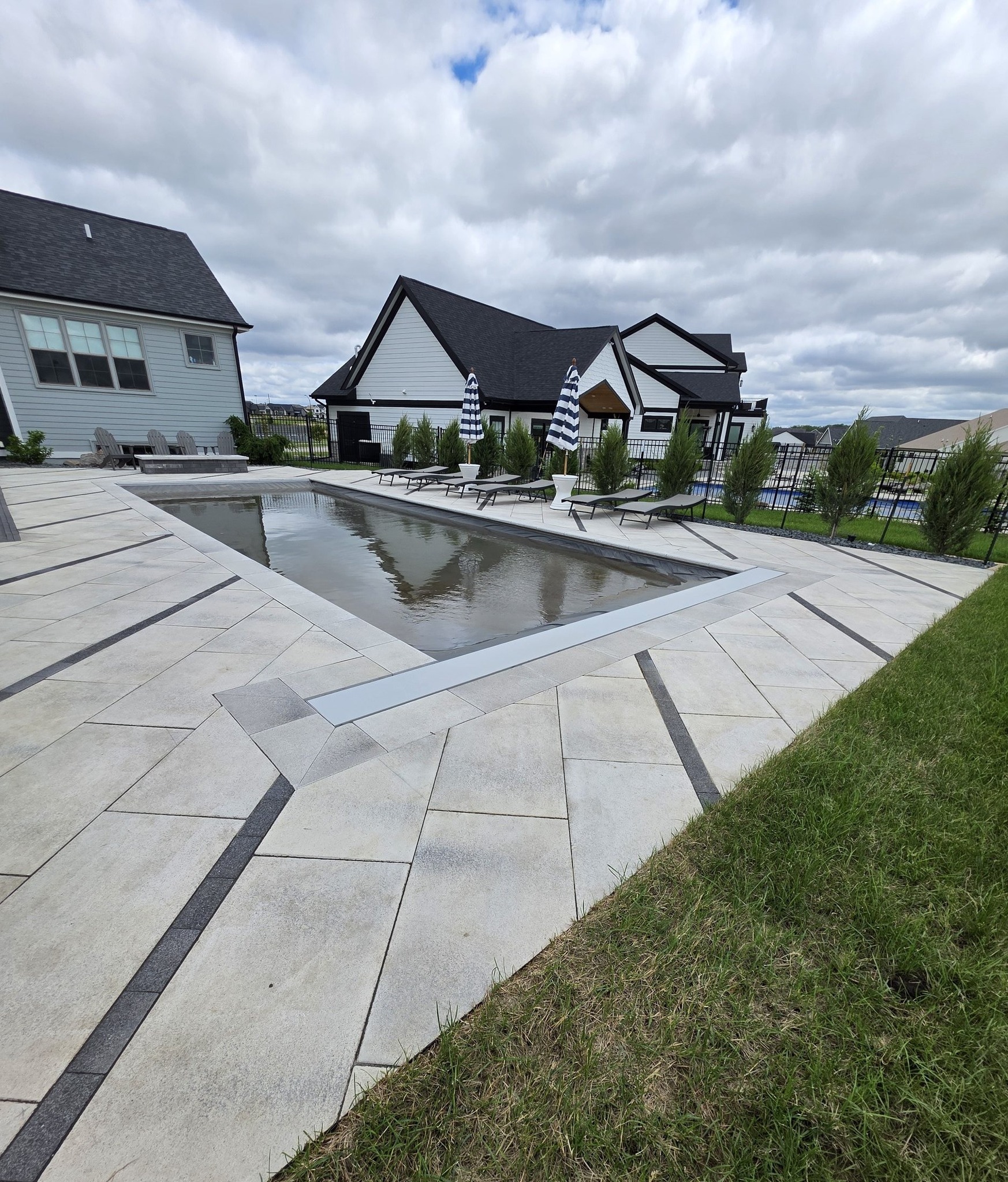 Pool Deck Installation by Slaymaker Landscaping