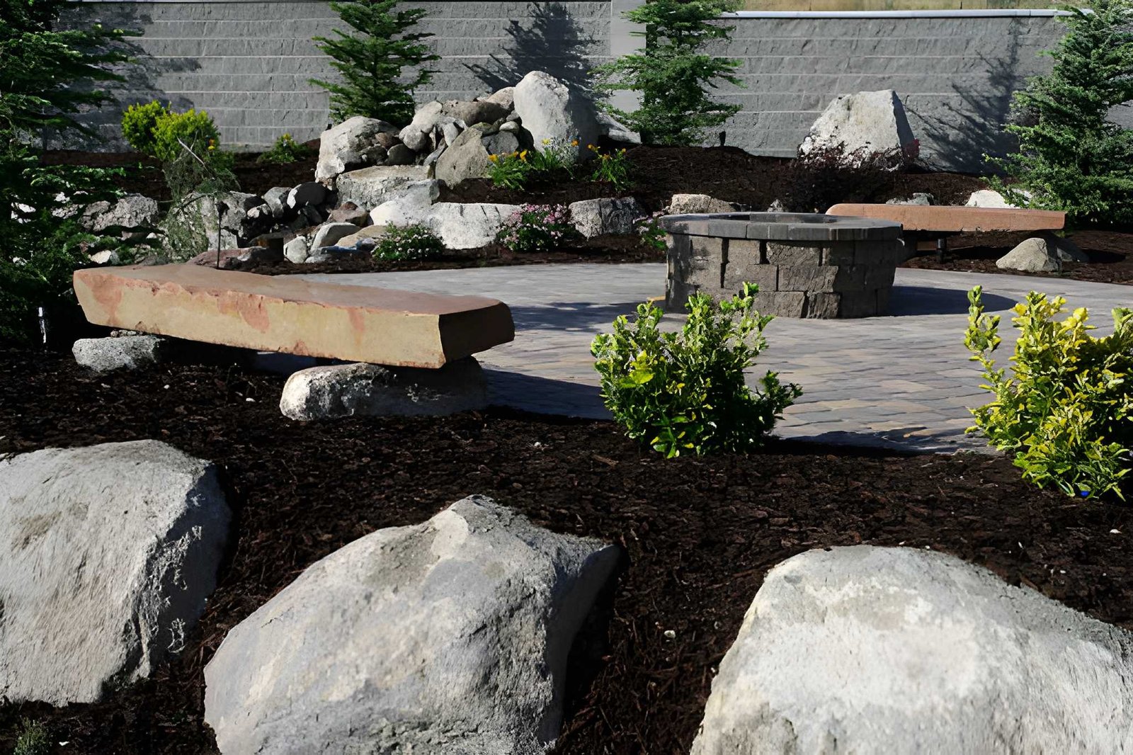 Paver patio with a fire-pit area